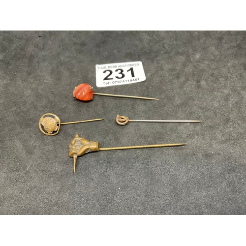 231 - 4 YELLOW METAL STICK PINS