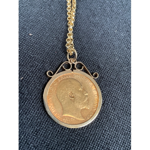 237 - 9CT GOLD CHAIN AND MOUNT WITH HALF SOVEREIGN INSERT TOTAL WEIGHT 11G