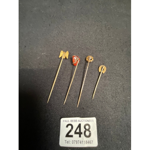 248 - 4 YELLOW METAL STICK PINS `