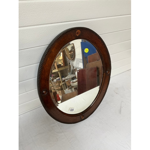 324 - OAK FRAMED MIRROR A/F 25