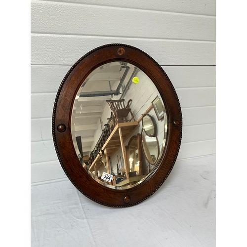 324 - OAK FRAMED MIRROR A/F 25