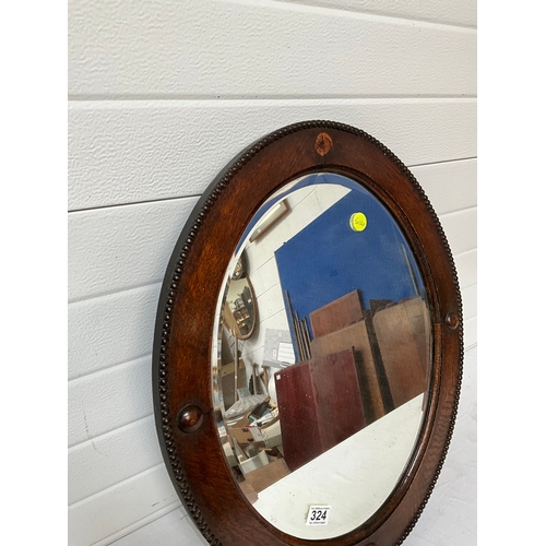 324 - OAK FRAMED MIRROR A/F 25