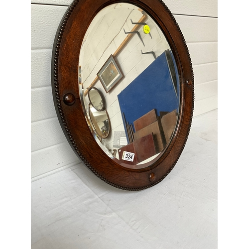 324 - OAK FRAMED MIRROR A/F 25