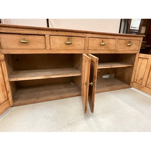 372 - STRIPPED PINE VICTORIAN KITCHEN BASE WITH 4 DRAWERS OVER 2 DOORS H36