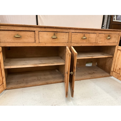 372 - STRIPPED PINE VICTORIAN KITCHEN BASE WITH 4 DRAWERS OVER 2 DOORS H36