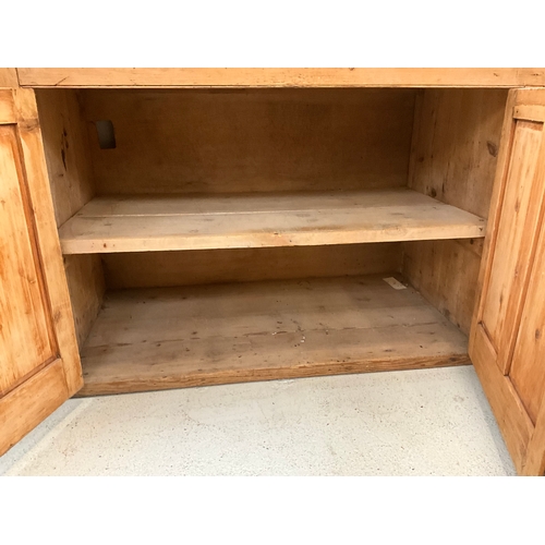 372 - STRIPPED PINE VICTORIAN KITCHEN BASE WITH 4 DRAWERS OVER 2 DOORS H36