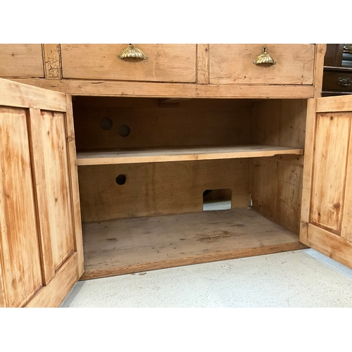 372 - STRIPPED PINE VICTORIAN KITCHEN BASE WITH 4 DRAWERS OVER 2 DOORS H36