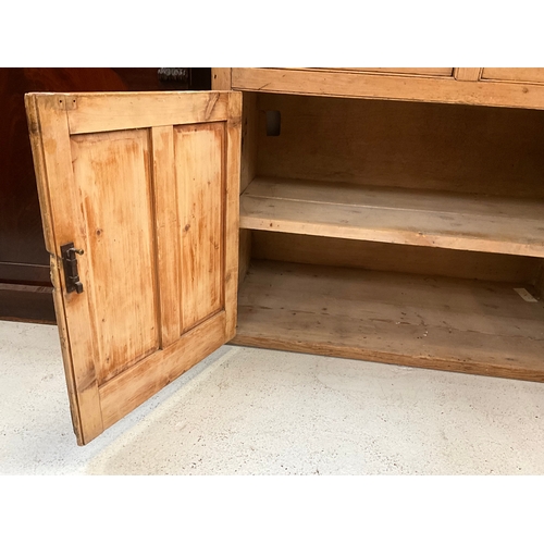 372 - STRIPPED PINE VICTORIAN KITCHEN BASE WITH 4 DRAWERS OVER 2 DOORS H36