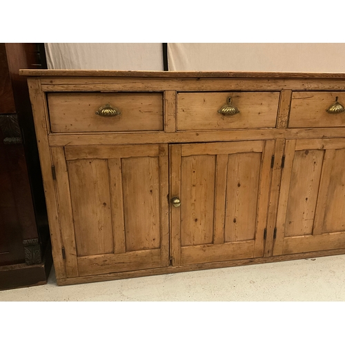 372 - STRIPPED PINE VICTORIAN KITCHEN BASE WITH 4 DRAWERS OVER 2 DOORS H36