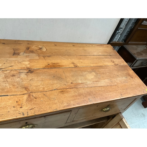 372 - STRIPPED PINE VICTORIAN KITCHEN BASE WITH 4 DRAWERS OVER 2 DOORS H36