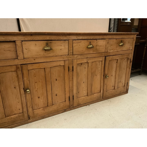 372 - STRIPPED PINE VICTORIAN KITCHEN BASE WITH 4 DRAWERS OVER 2 DOORS H36