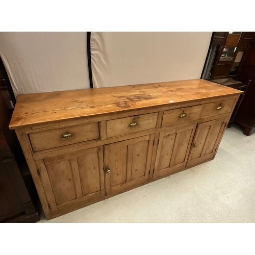 372 - STRIPPED PINE VICTORIAN KITCHEN BASE WITH 4 DRAWERS OVER 2 DOORS H36