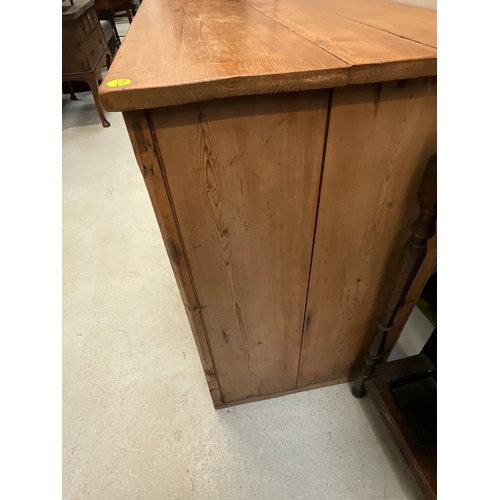 372 - STRIPPED PINE VICTORIAN KITCHEN BASE WITH 4 DRAWERS OVER 2 DOORS H36