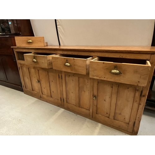 372 - STRIPPED PINE VICTORIAN KITCHEN BASE WITH 4 DRAWERS OVER 2 DOORS H36