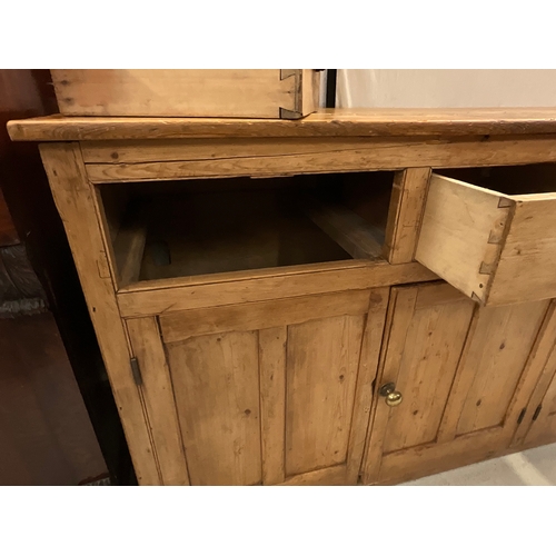 372 - STRIPPED PINE VICTORIAN KITCHEN BASE WITH 4 DRAWERS OVER 2 DOORS H36