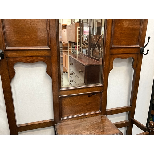 375 - EDWARDIAN OAK HALLSTAND WITH CENTRAL MIRROR OVER SINGLE DRAWER COMPLETE WITH DRIP TRAYS H80