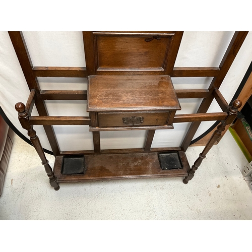 375 - EDWARDIAN OAK HALLSTAND WITH CENTRAL MIRROR OVER SINGLE DRAWER COMPLETE WITH DRIP TRAYS H80