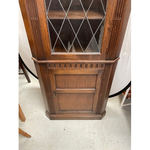 381 - PRIORY OAK CORNER CABINET WITH LEADED GLASS DOOR TO TOP H66