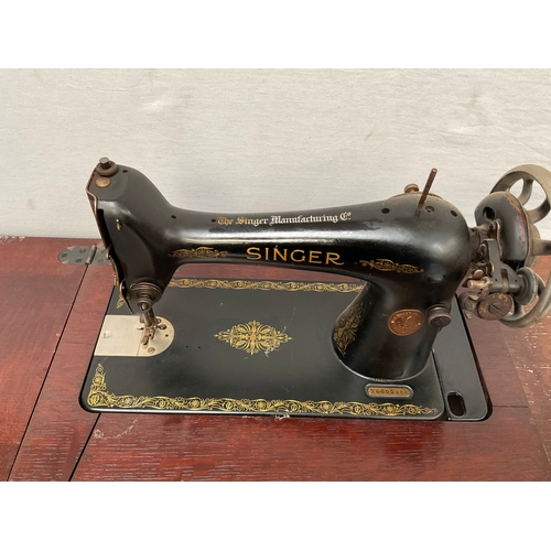 385 - VINTAGE TREADLE SEWING MACHINE TABLE H32.5