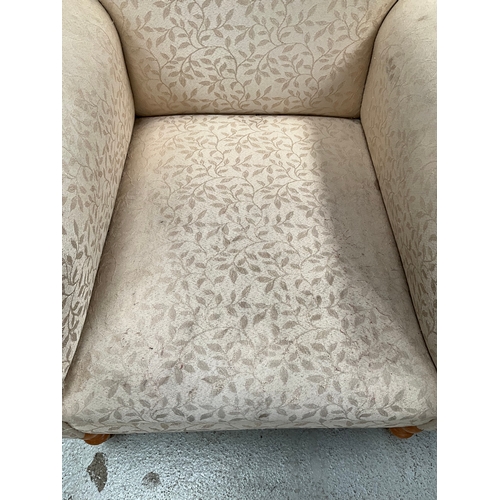 418 - STEWART JONES UPHOLSTERED BEDROOM CHAIR ON TURNED FRONT LEGS WITH BRASS CASTORS A/F TOTAL HEIGHT 34