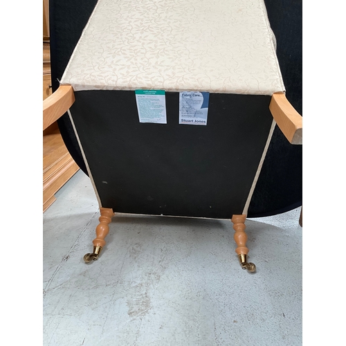 418 - STEWART JONES UPHOLSTERED BEDROOM CHAIR ON TURNED FRONT LEGS WITH BRASS CASTORS A/F TOTAL HEIGHT 34