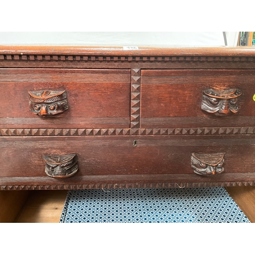 462 - EARLY OAK 2 OVER 3 CHEST OF DRAWERS WITH CARVED FACE DECORATIVE HANDLES H36