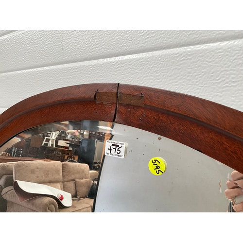 475 - OVAL OAK FRAMED WALL MIRROR OF LARGE PROPORTIONS 31