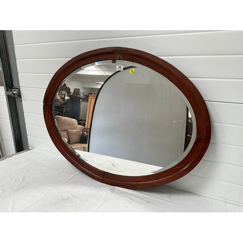 475 - OVAL OAK FRAMED WALL MIRROR OF LARGE PROPORTIONS 31