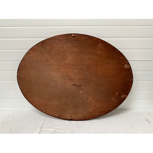 475 - OVAL OAK FRAMED WALL MIRROR OF LARGE PROPORTIONS 31