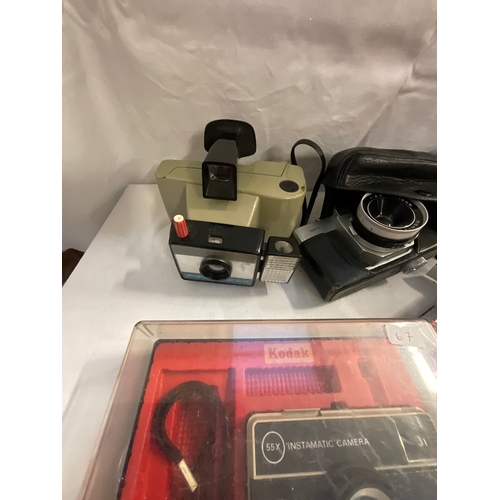 74 - *******lot withdrawn by vendor******BOX OF CAMERAS & RECORD PLAYER (ITEM 143)