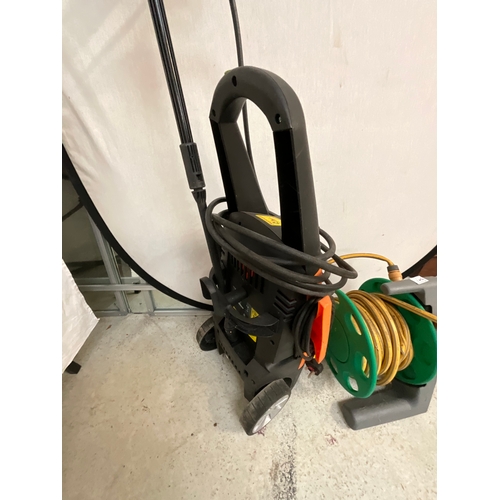 142 - RAC PRESSURE WASHER AND HOSE ON REEL