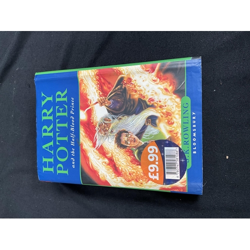 203 - 8 VOLUMES OF HARRY POTTER BOOKS