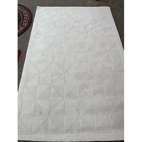 235 - BEIGE PATTERNED CARPET 95