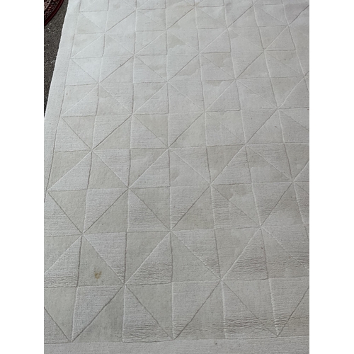 235 - BEIGE PATTERNED CARPET 95