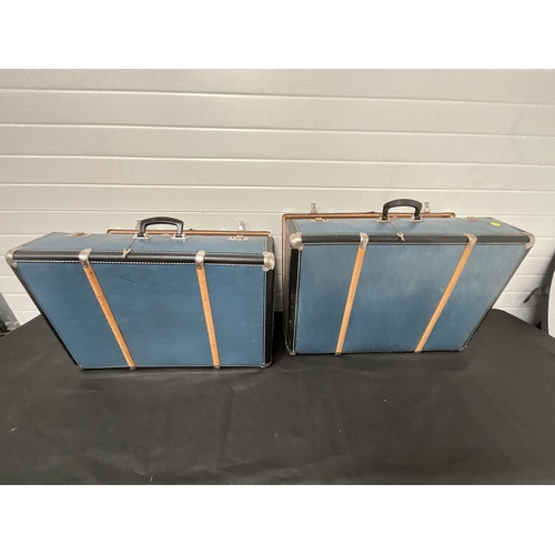 342 - 2 VINTAGE BLUE TRAVELLERS CHESTS 
H10