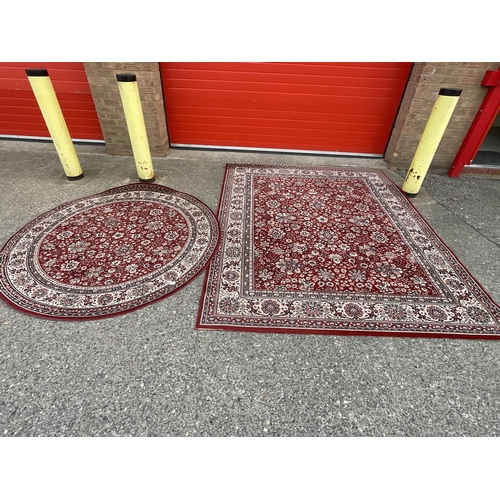 371 - RED PATTERNED CIRCULAR CARPET DIA 67