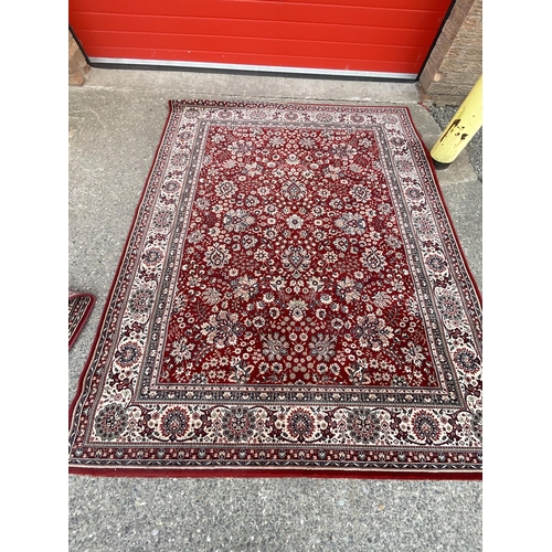 371 - RED PATTERNED CIRCULAR CARPET DIA 67