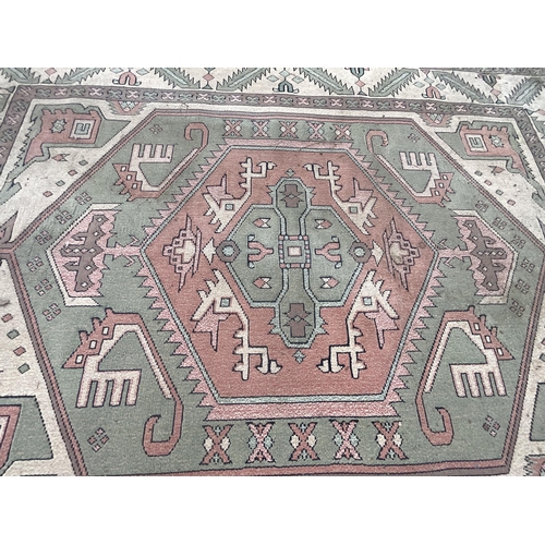 373 - GREEN PATTERNED CARPET 90