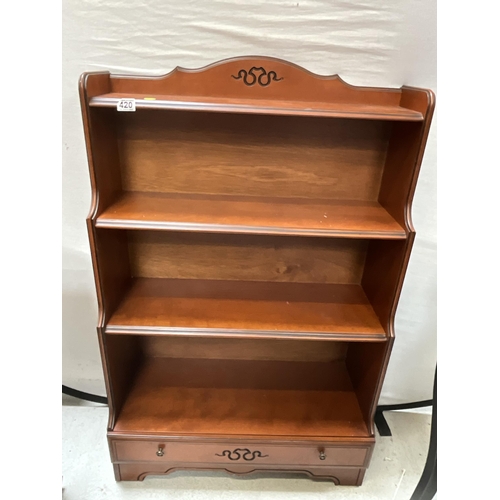 420 - MODERN MAHOGANY WATERFALL BOOKCASE WITH DRAWER TO BASE H47