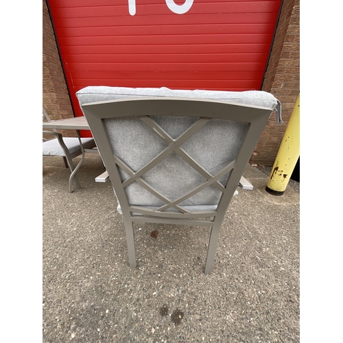 428 - METAL GARDEN TABLE AND 4 MATCHING CHAIRS COMPLETE WITH CUSHIONS H28