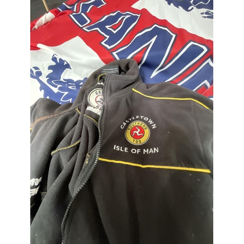 429 - COLLECTION OF FOOTBALL FLAGS AND A TT ISLE OF MAN FLEECE JACKET - LARGE FLAG 57