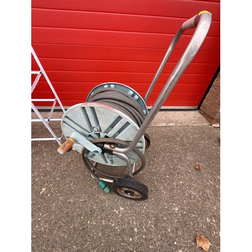 433 - HOSE ON REEL,TROLLEY,SHOE RACK ETC