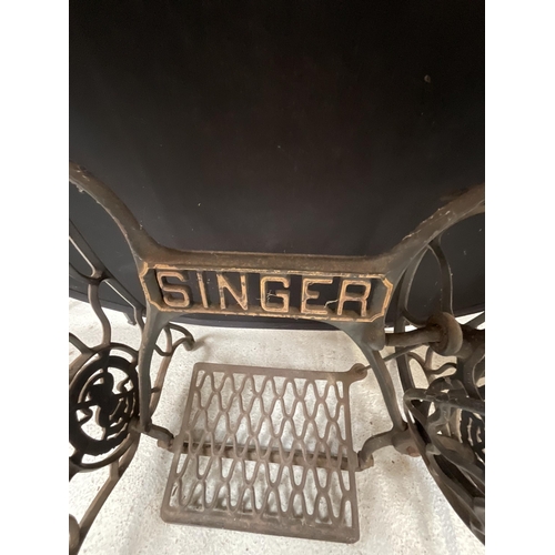 439 - SINGER CAST IRON BASED TABLE H29