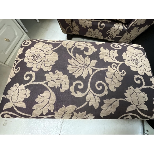 459 - MODERN UPHOLSTERED PURPLE PATTERNED ARM CHAIR AND MATCHING FOOT STOOL