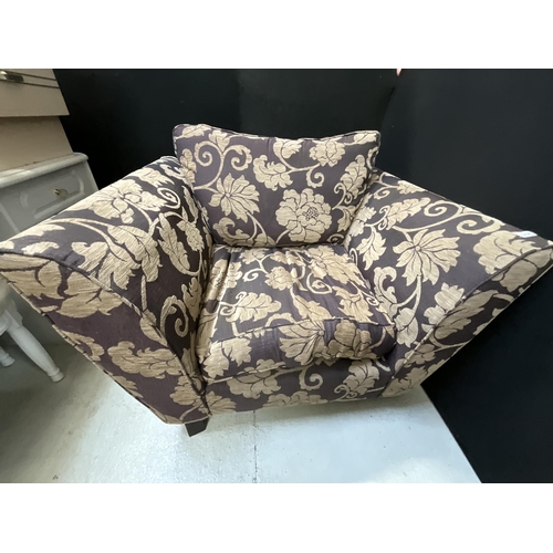 459 - MODERN UPHOLSTERED PURPLE PATTERNED ARM CHAIR AND MATCHING FOOT STOOL