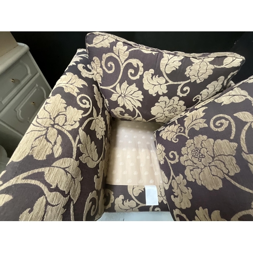 459 - MODERN UPHOLSTERED PURPLE PATTERNED ARM CHAIR AND MATCHING FOOT STOOL