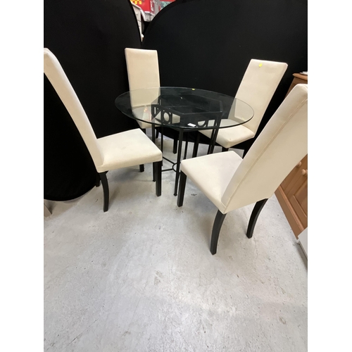 465 - MODERN CIRCULAR GLASS TOPPED TABLE AND 4 MATCHING CHAIRS - TABLE H29