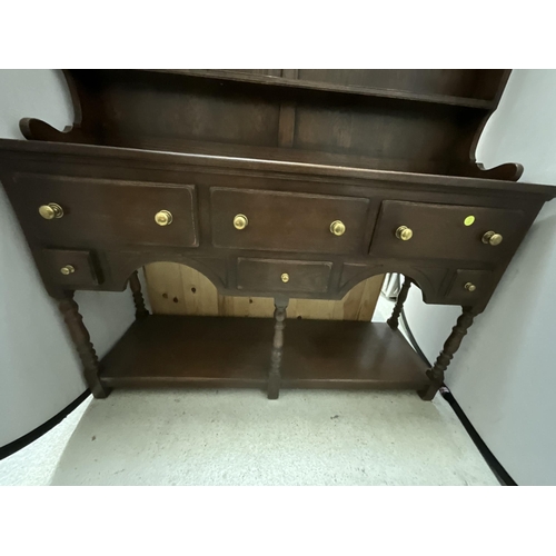 469 - DARK OAK DRESSER WITH RACK BASE WITH 6 DRAWERS AND POT BOARD SHELF H77