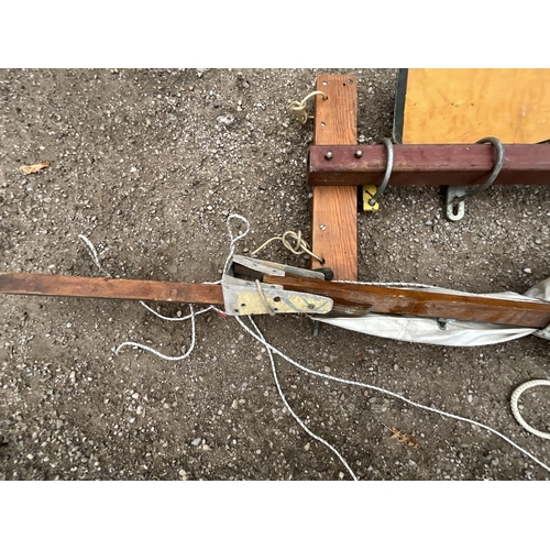 472 - LARGE VINTAGE CANOE WITH PADDLES,WHEELS ETC