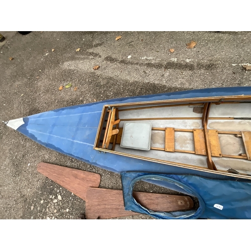 472 - LARGE VINTAGE CANOE WITH PADDLES,WHEELS ETC